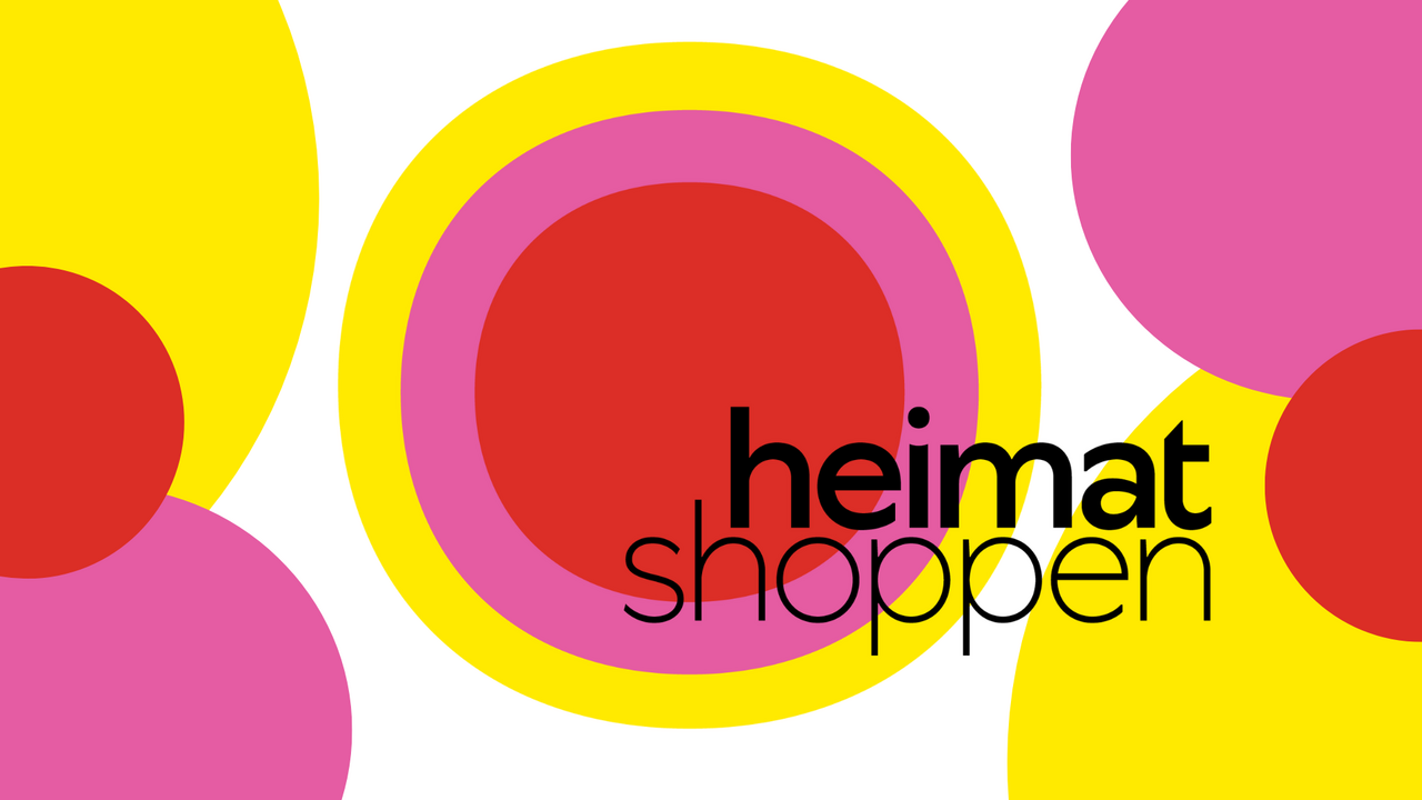 Grafisches Logo mit dem Text „heimat shoppen“ in schwarzer Schrift auf buntem Hintergrund. Der Hintergrund besteht aus überlappenden Kreisen und Halbkreisen in den Farben Gelb, Pink, Orange und Rot, die an ein Retro-Design erinnern.
