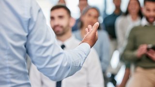 Speaker, hands and presentation for employees with close up for a meeting at conference room. Seminar, training and hand for discussion with corporate team for learning about business or career.